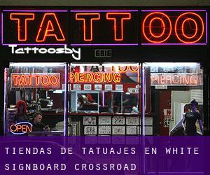 Tiendas de tatuajes en White Signboard Crossroad
